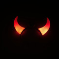 Illuminated headband-shaped devil horns, operate with red LEDs.